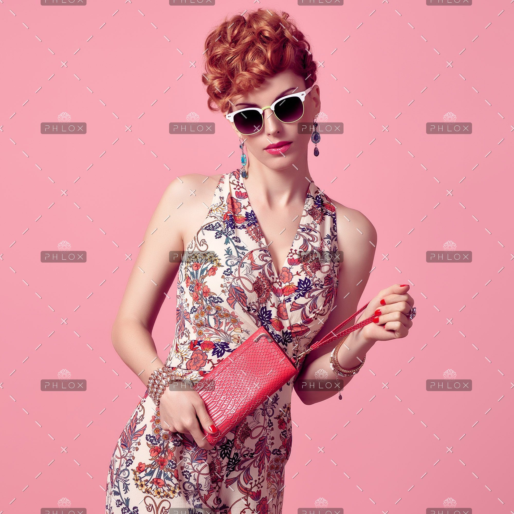 demo-attachment-685-fashion-redhead-model-in-summer-jumpsuit-on-pink-PXX3EL8